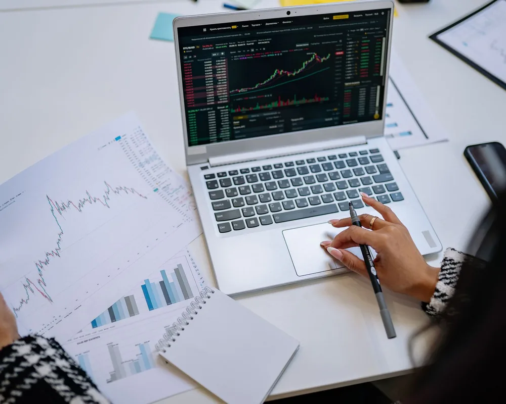 Financial charts on laptop