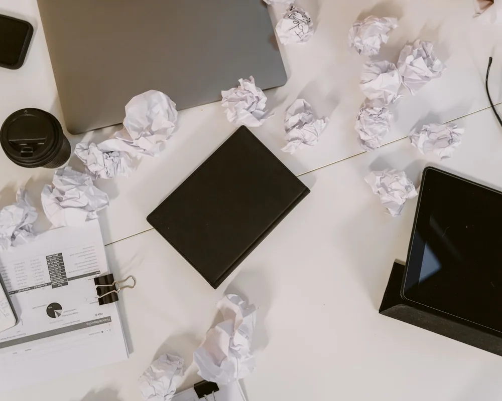 Disorganised receipts on desk