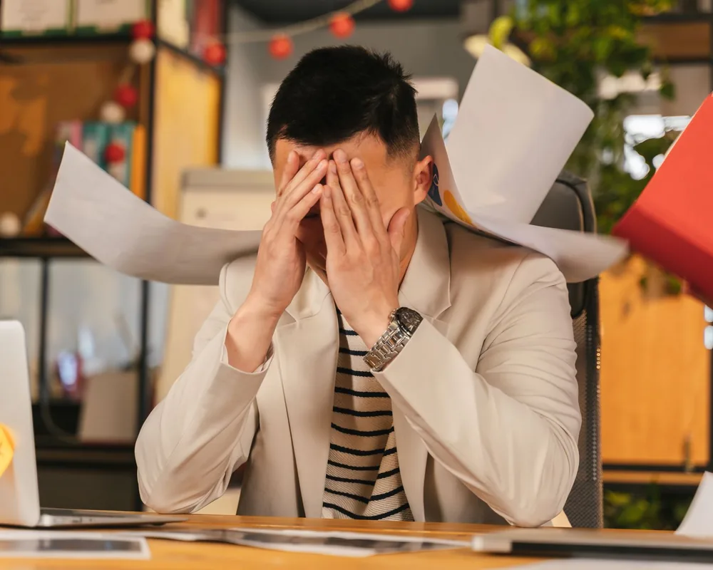 Business owner with paperwork